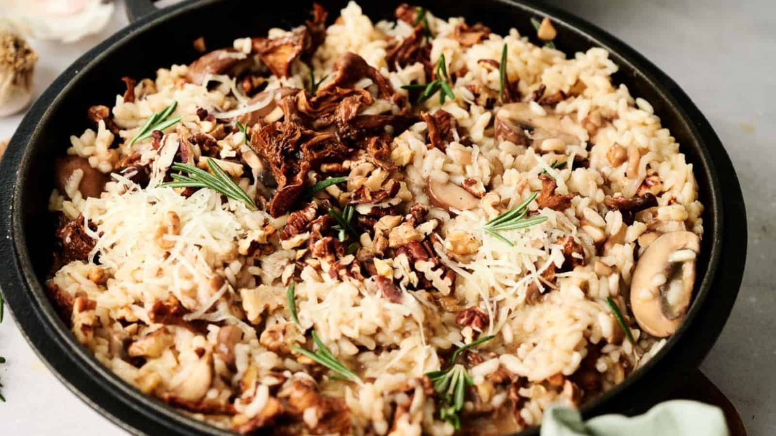 A bowl of risotto with mushrooms and parmesan cheese.