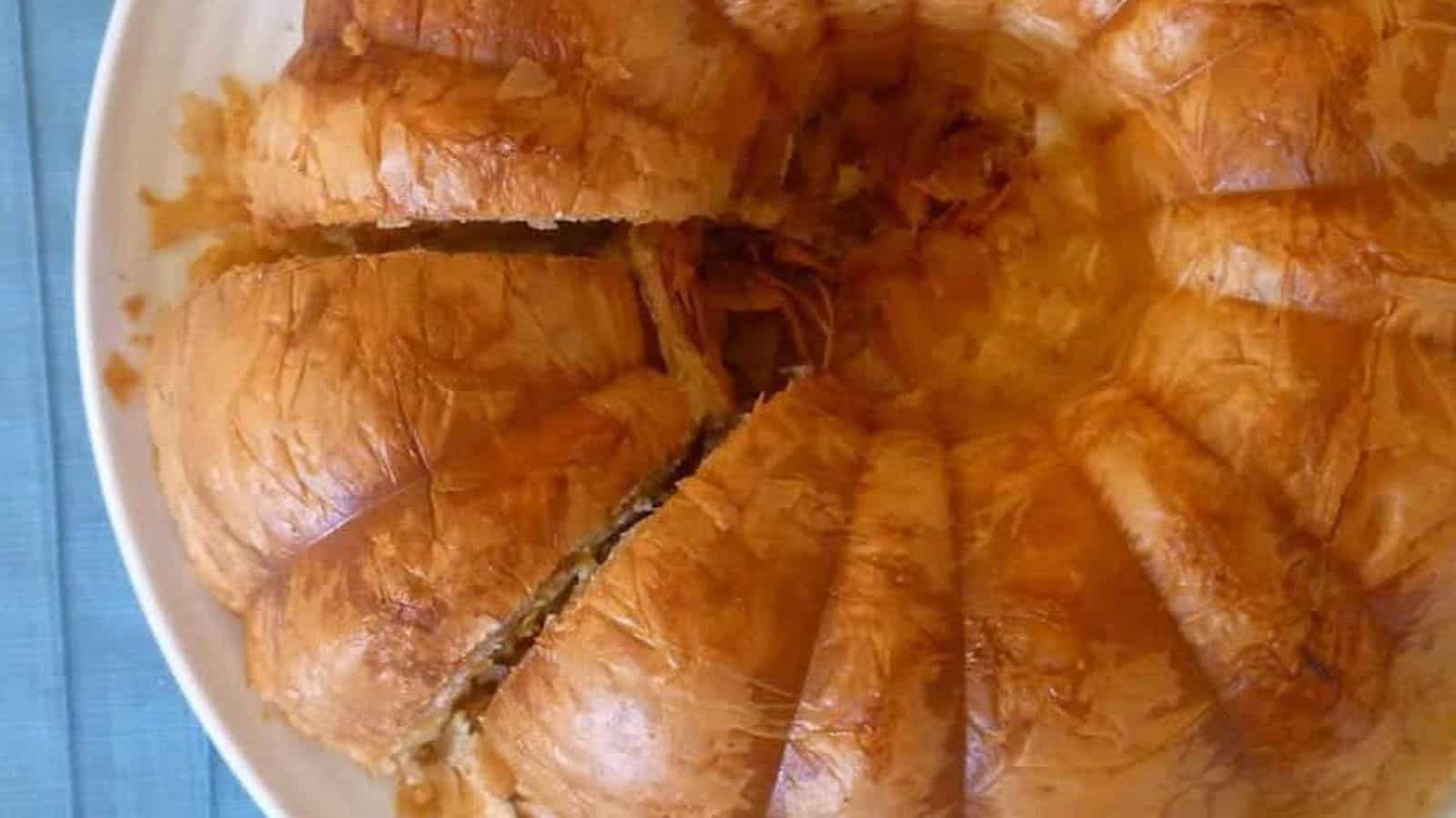 Overhead shot of a phyllo pie cooked in a bundt pan.