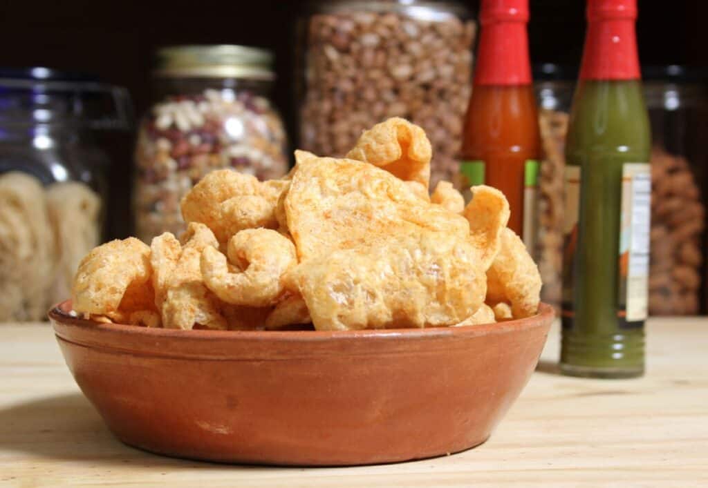 A bowl of food on a table.