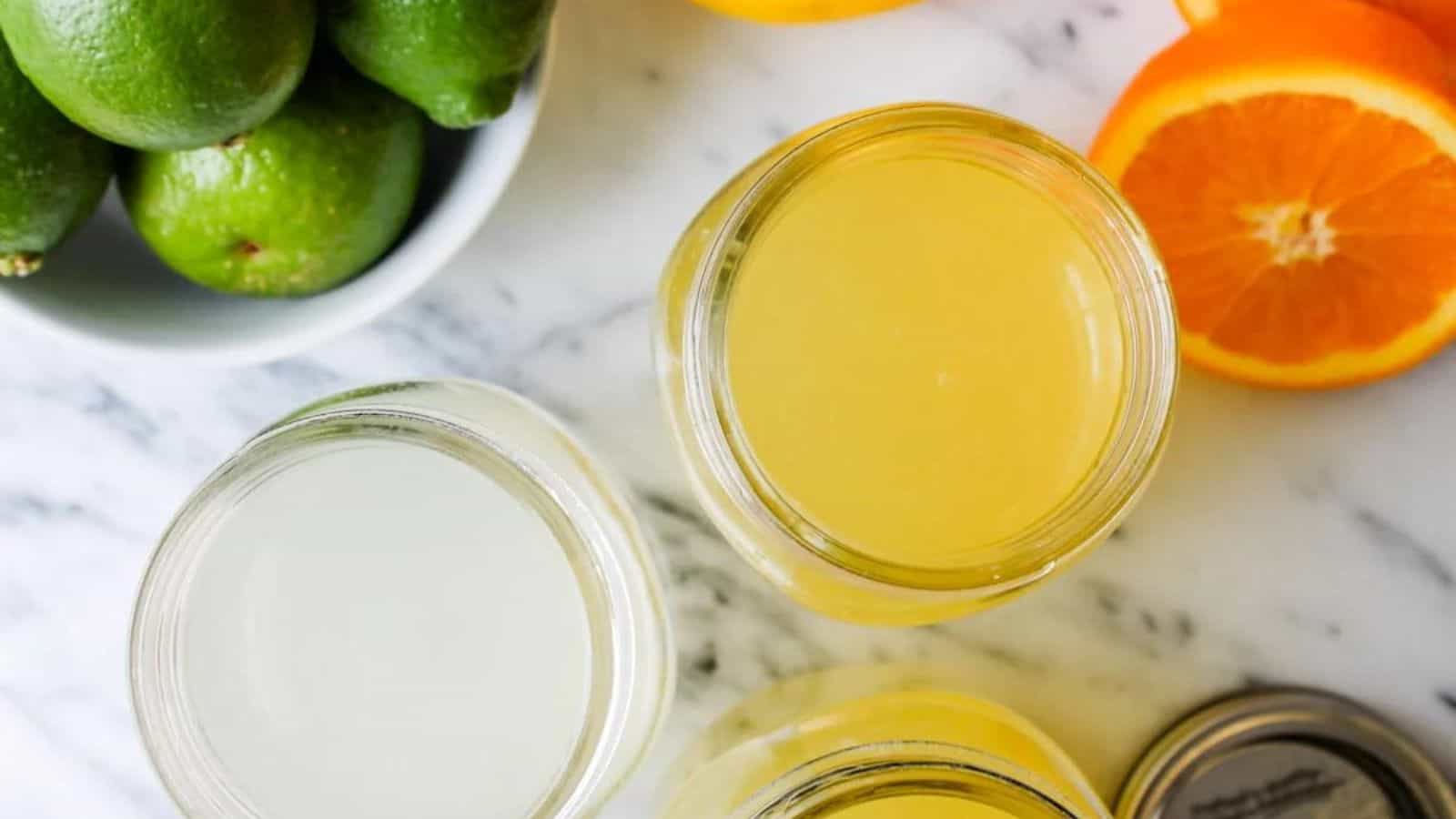 Overhead image of homemade gatorade in jars.