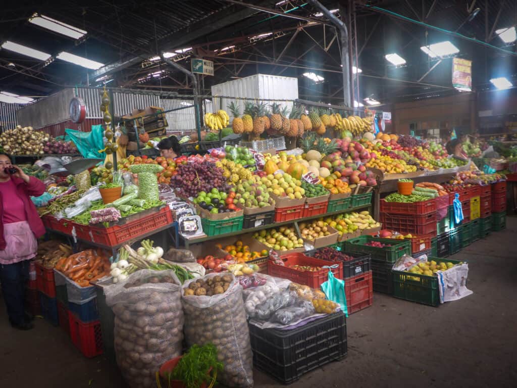 A bustling market offering an array of fresh and vibrant fruits and vegetables.