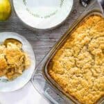 A dish of apple cobbler with apples and pear recipes on it.