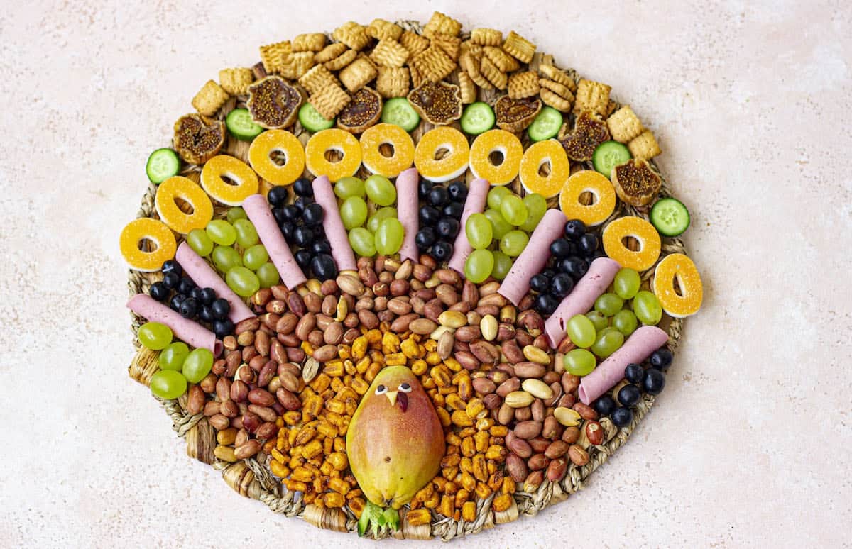 A fruit-filled turkey shaped platter.