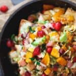 A skillet filled with cranberry and ham quesadilla.