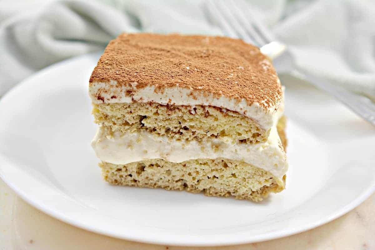 A slice of tiramisu cake on a plate.