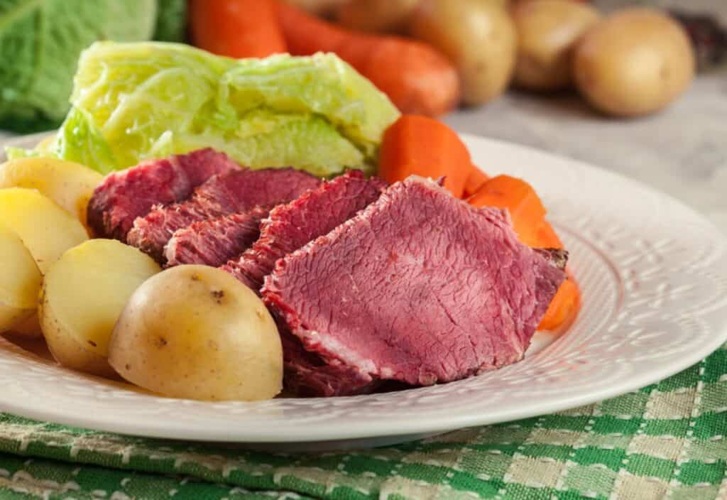 Corned beef and cabbage on a plate.