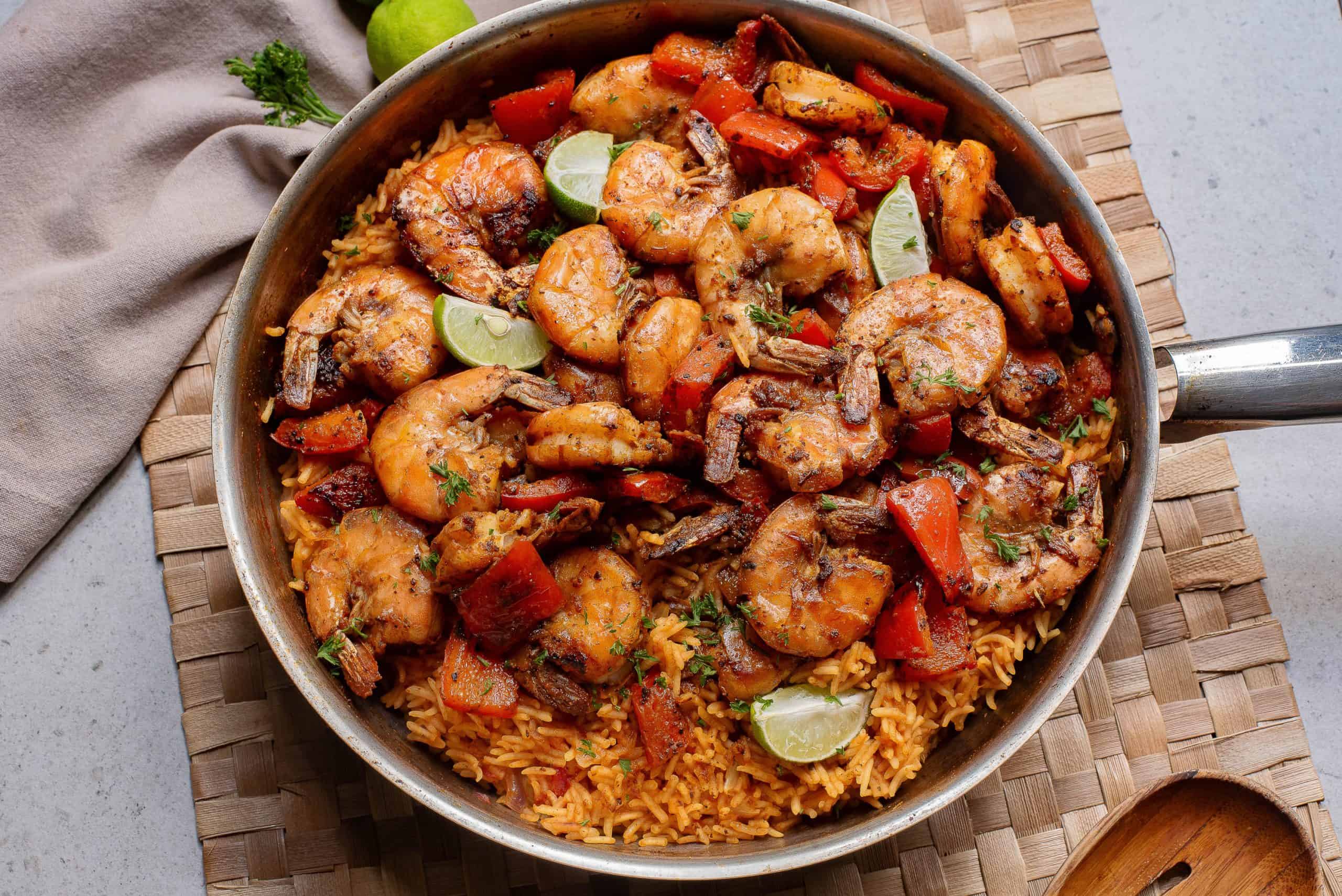 Shrimp and rice in a skillet.