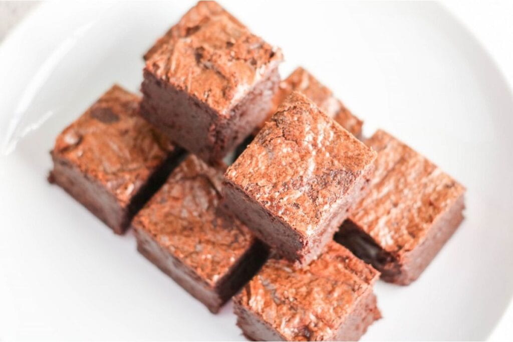 Close-up of a plate of freshly baked brownies.
