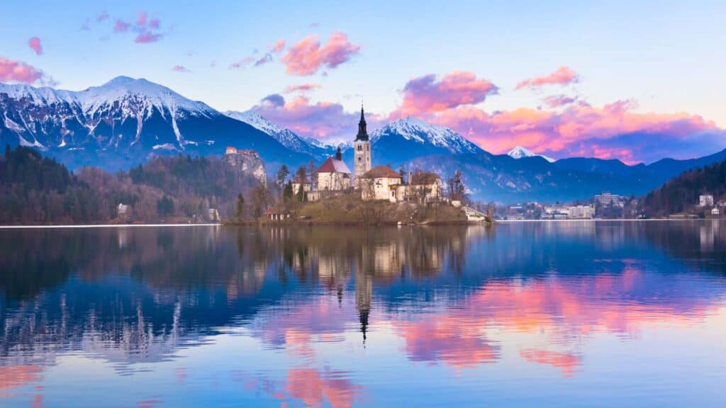 Lake Bled, Slovenia, one of the cheapest travel destinations in Europe, at sunset.