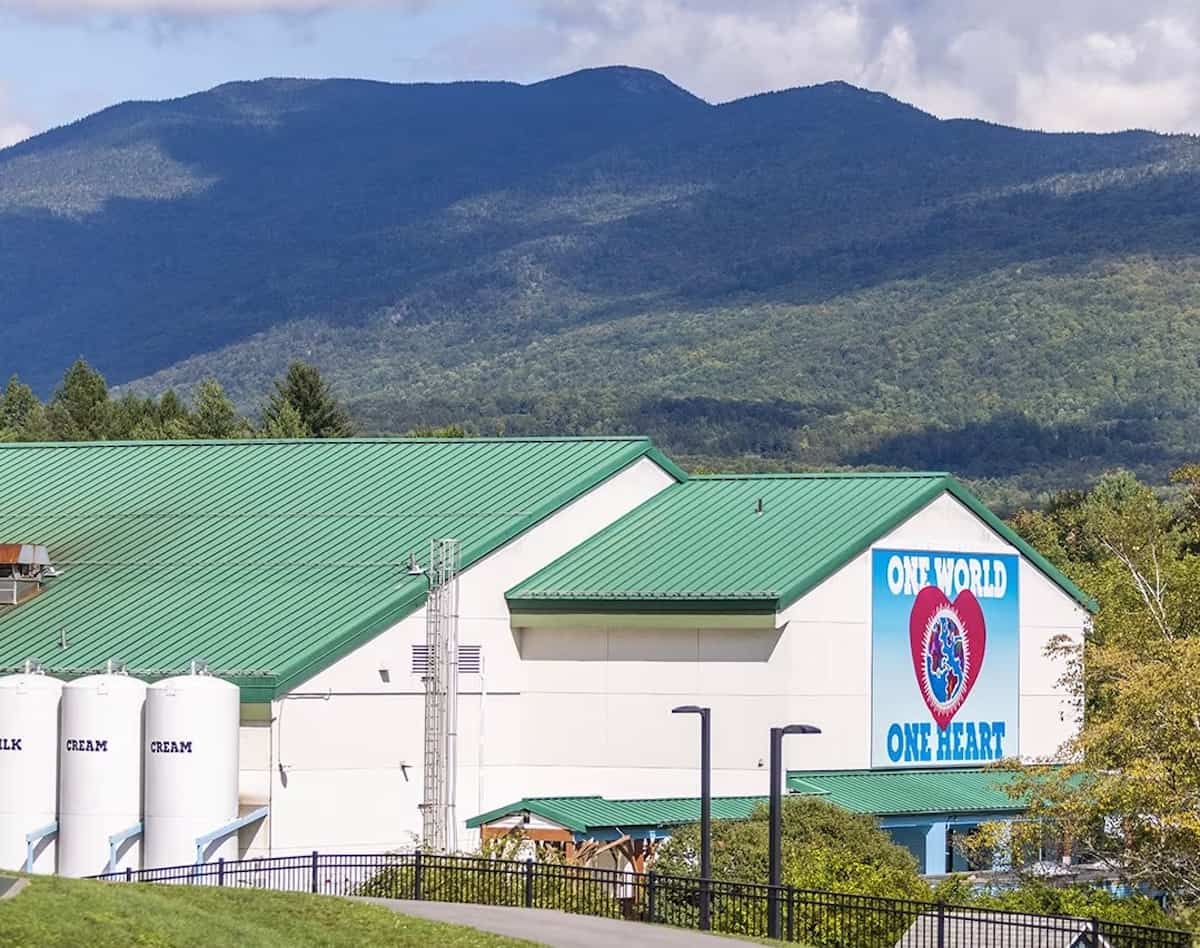 View of Ben and Jerry's factory in Waterbury Vermont with mountains behind.