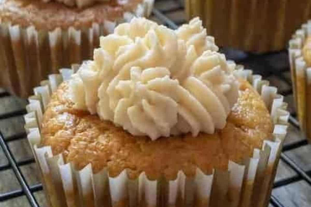 Carrot cake muffin on a cooling rack.