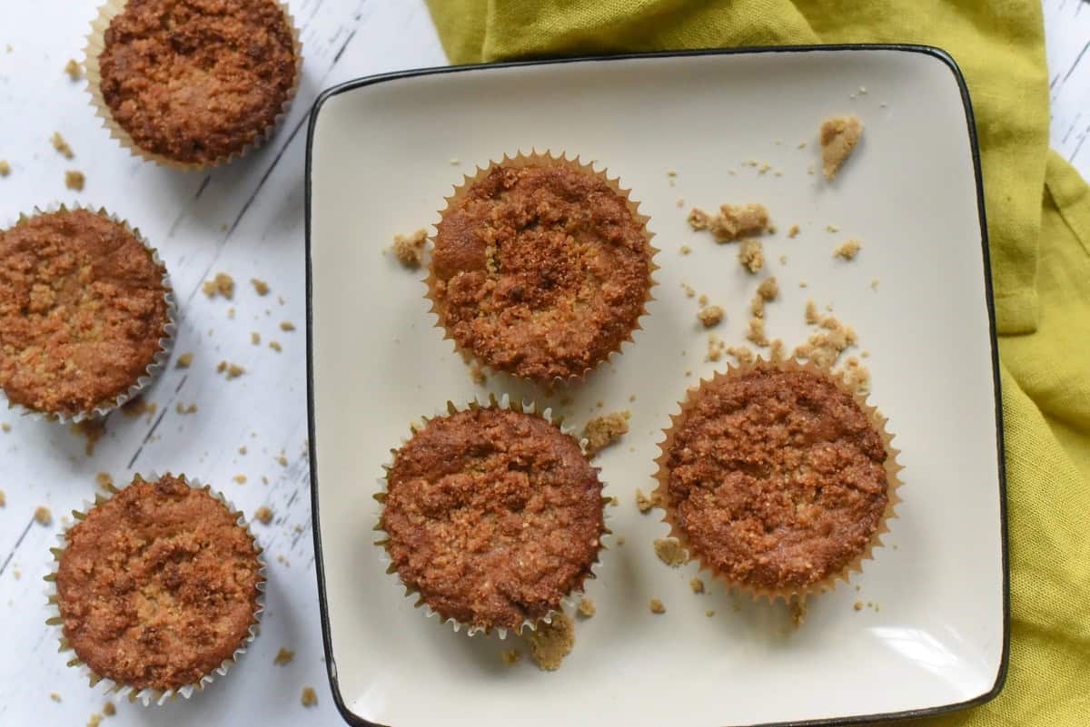 Crumb muffins on a plate.