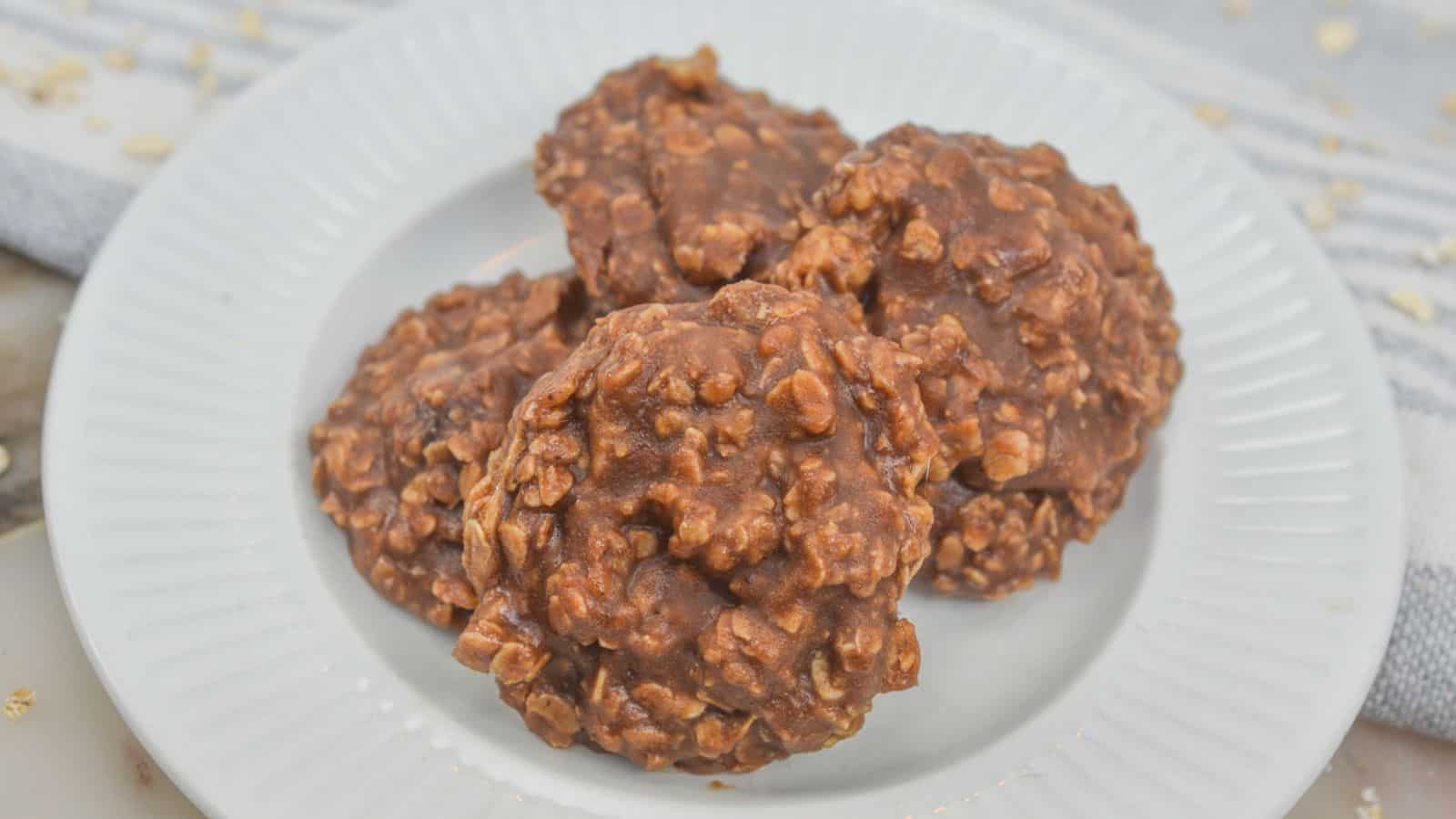 Chocolate oatmeal no-bake cookies on a white plate.