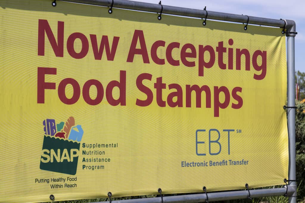A banner advertising the acceptance of food stamps, with snap and ebt program logos.