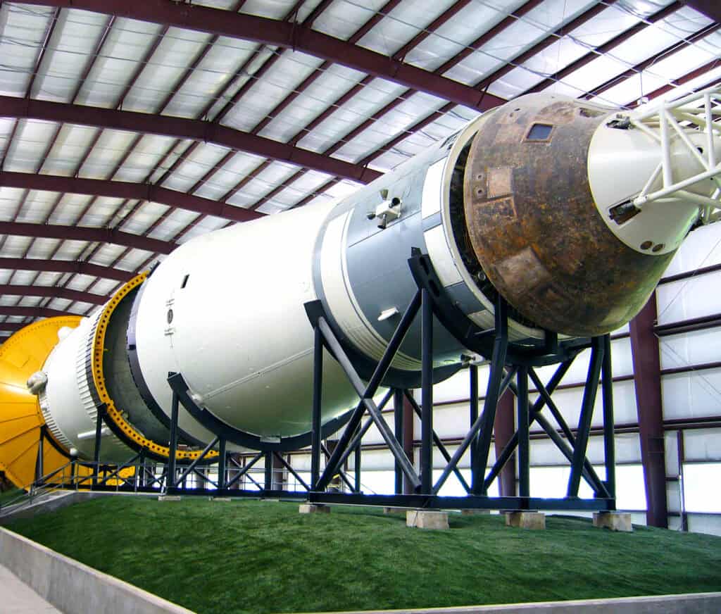 Houston Space Center shuttle on a grass floor.