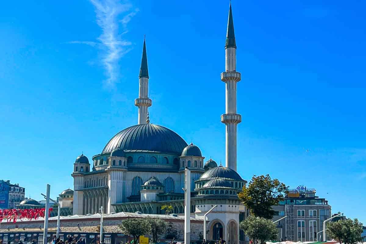 A large mosque in Istanbul with two tall minarets and a prominent dome.