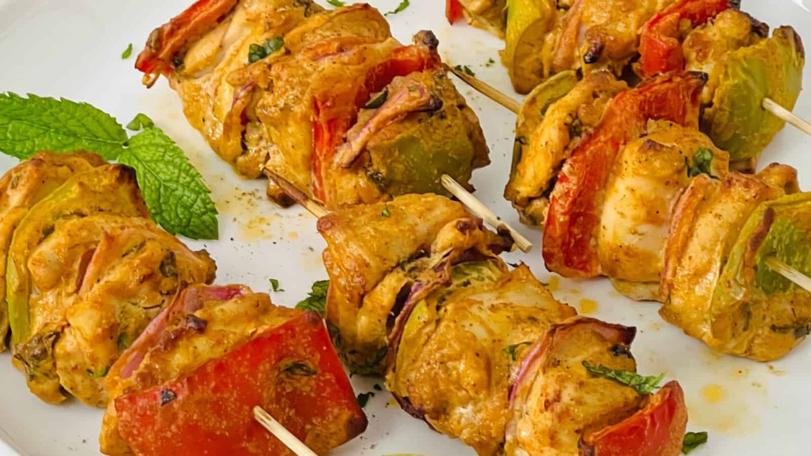 Chicken tikka in skewers.