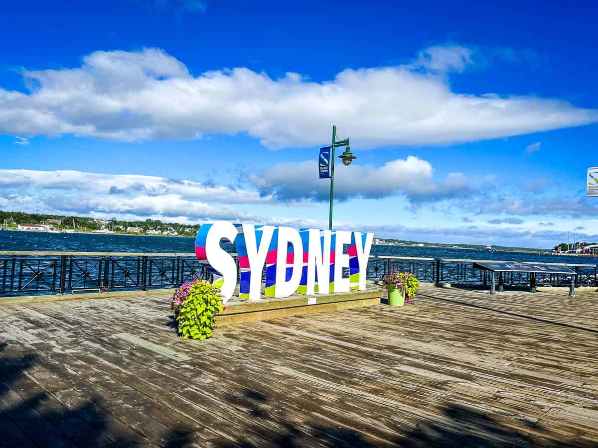 The Sydney Sign on the boardwalk i n Sydney, Nova Scotia.