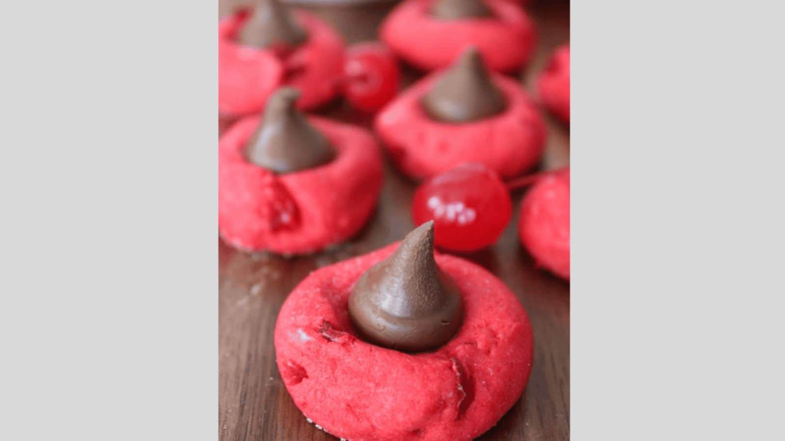 A cherry cookie topped with a hershey kiss.