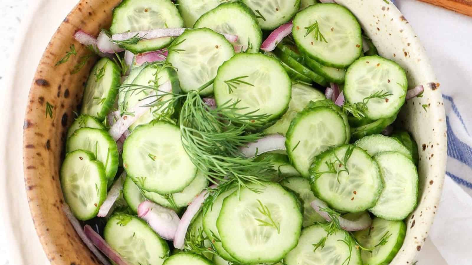 A fresh cucumber salad with sliced cucumbers and a light dressing.