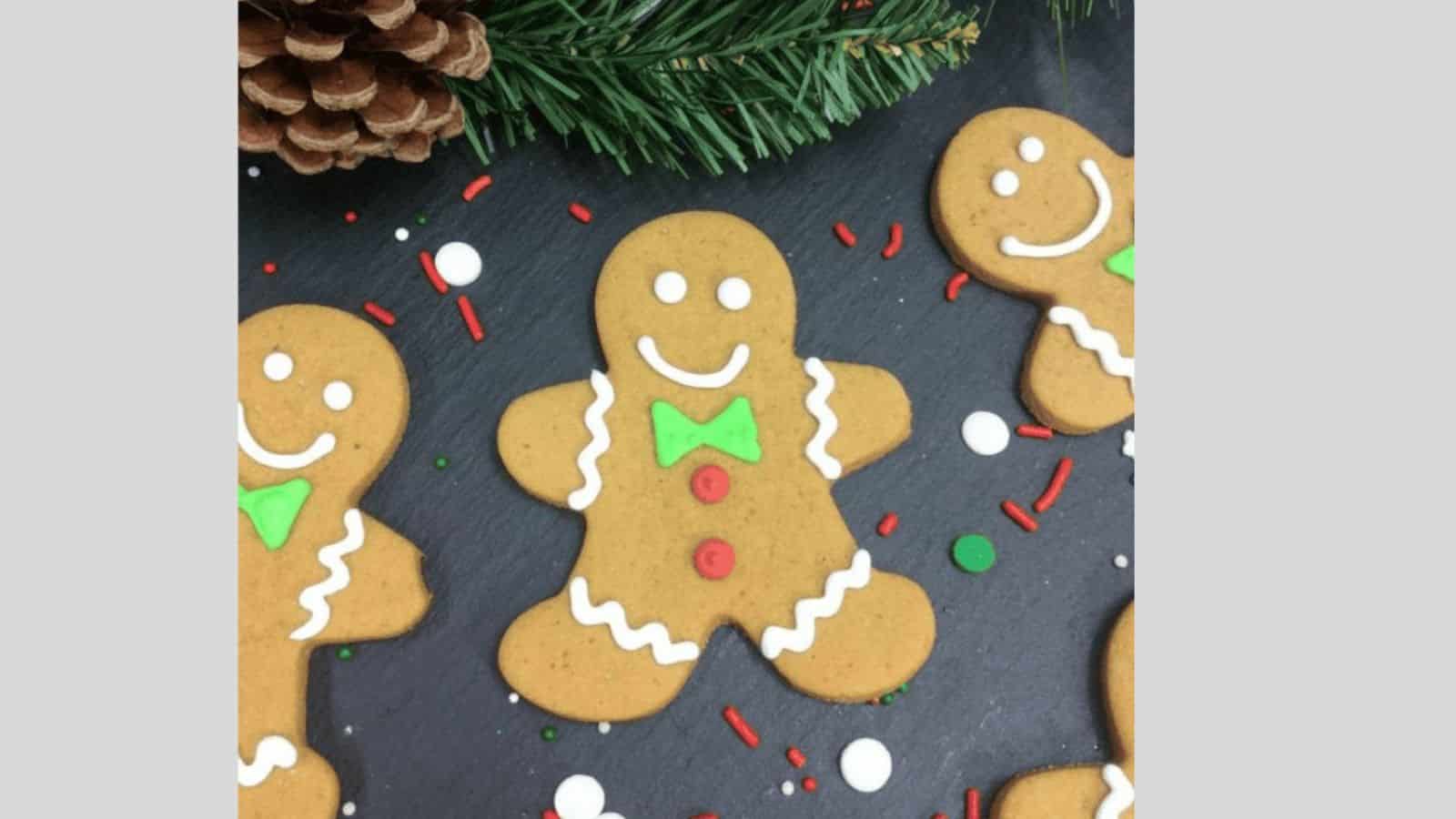 Gingerbread cookies with red buttons and green bow ties.