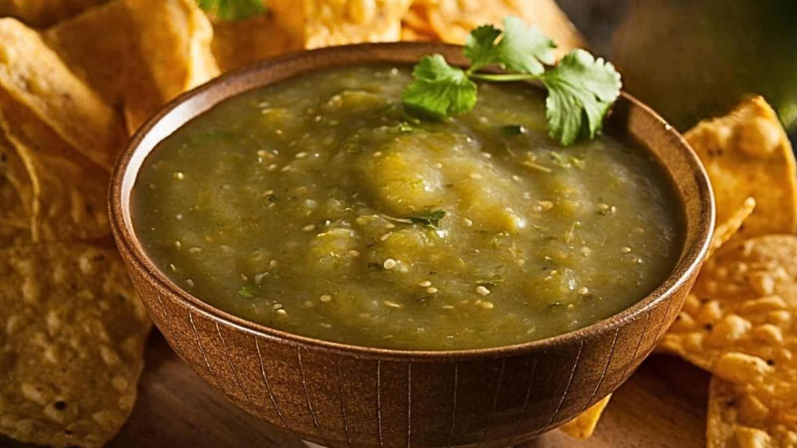 A bowl of green tomato salsa verde with a fresh and chunky texture.