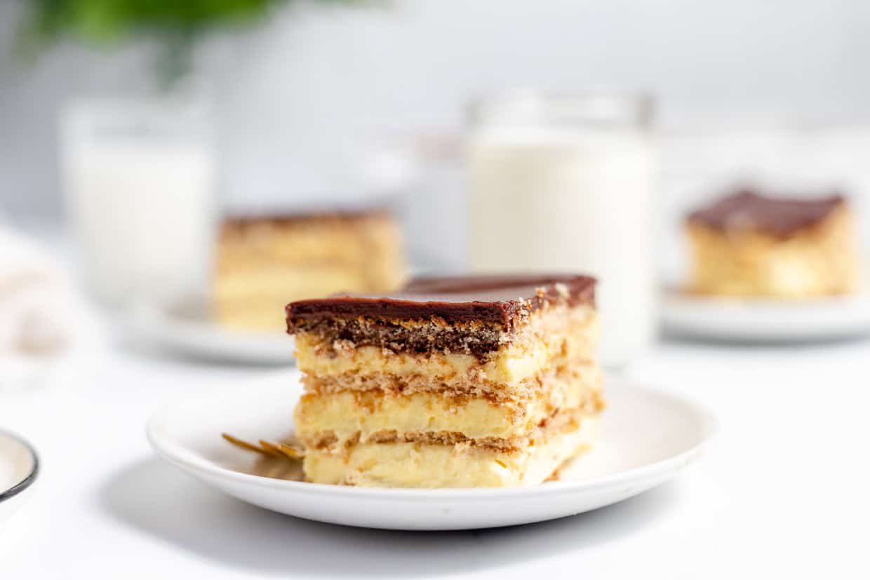 Slice of No-Bake Éclair Cake with layers. 