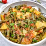 Greek Green Beans served in a white bowl.