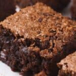 Close-up of a batch of pumpkin brownies with a crispy top and moist interior.