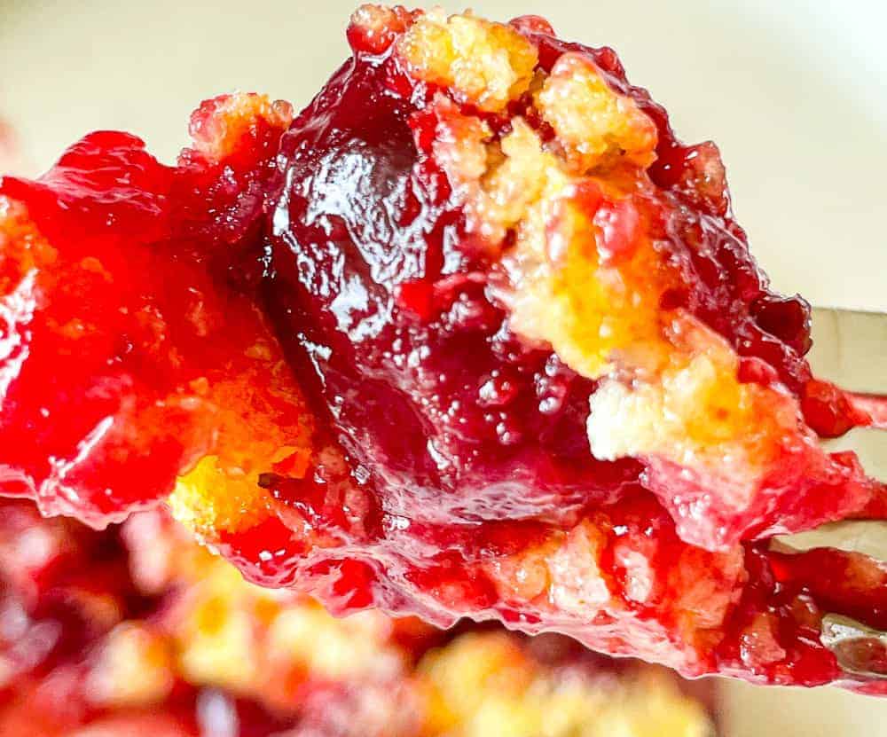 Cherry dump cake in a baking dish.