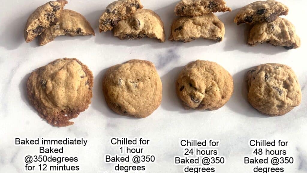 Four chocolate chip cookies baked after different chilling cookie dough times, from left to right: no chill, 1 hour chill, 24 hours chill, and 48 hours chill, each split in half to show texture.