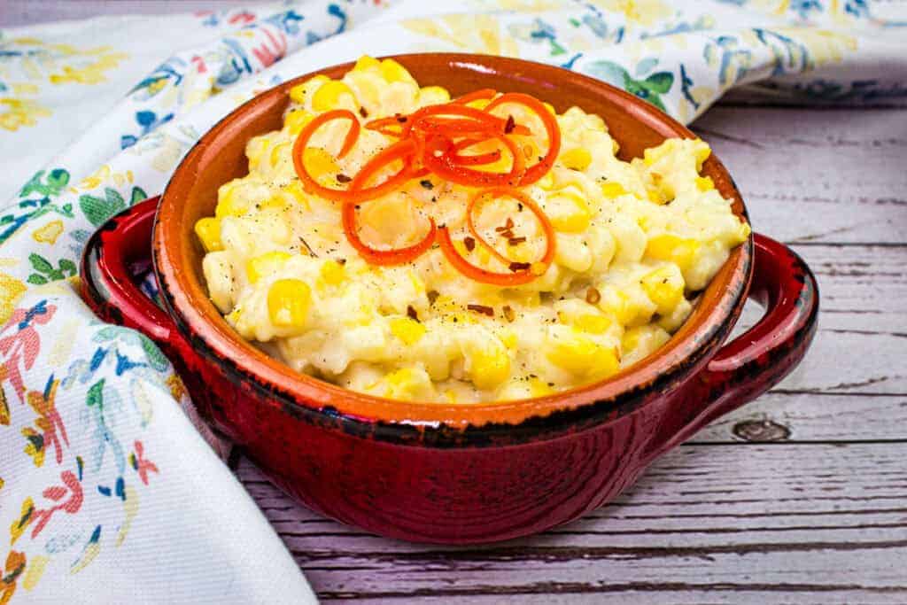 A close-up of smooth creamed corn with a creamy texture.