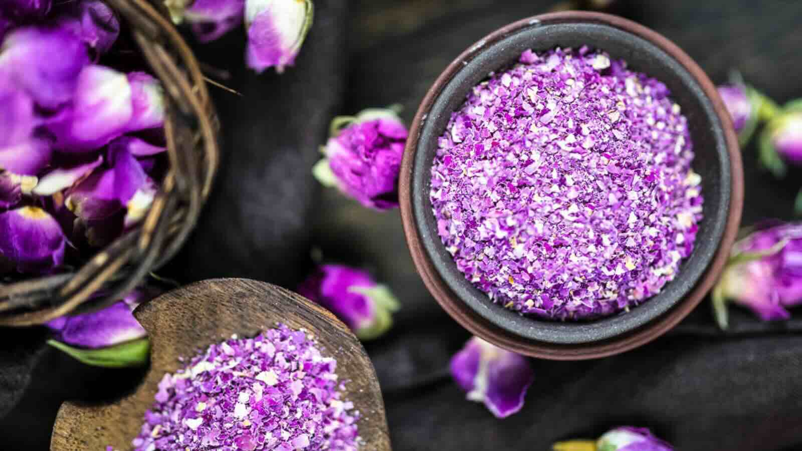 Rose petal tea in a cu with rose bud.