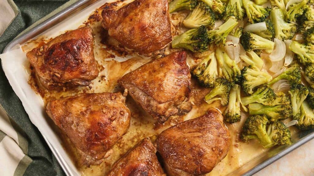 Sheet pan chicken thighs is a delicious, inexpensive dish you can whip up on busy days. Imagine perfectly seasoned chicken thighs with juicy centers and caramelized, slightly charred broccoli florets -&nbsp; all roasted to perfection in a single pan. Healthy, wholesome, and a breeze to cook, it&rsquo;s weeknight dinner gold right here.