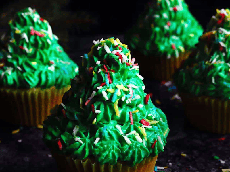 Christmas Tree Cupcakes with sprinkles.
