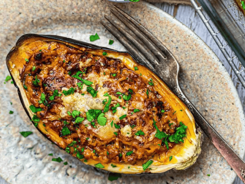 Stuffed melanzani served on a plate.