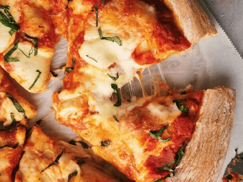 A quick and easy pizza recipe on a white plate.