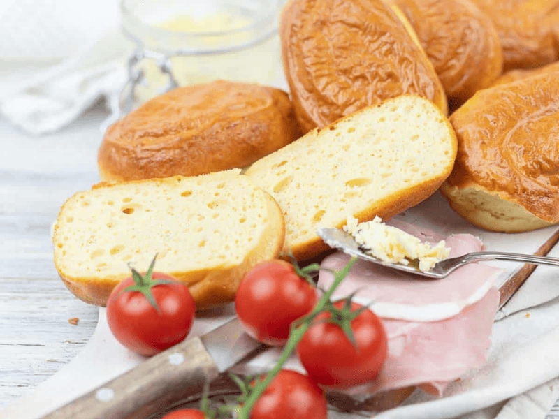 Protein Buns sliced with toppings for breakfast.