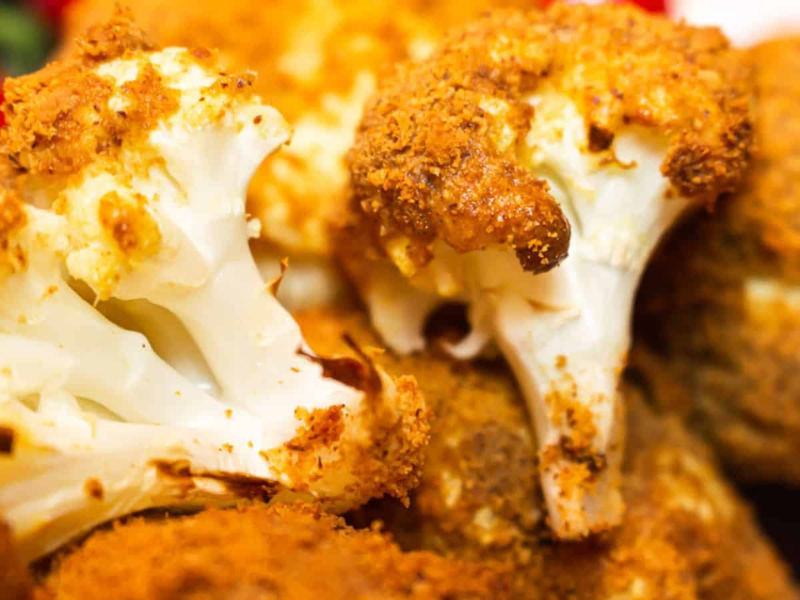 Pieces of breaded cauliflower close up.
