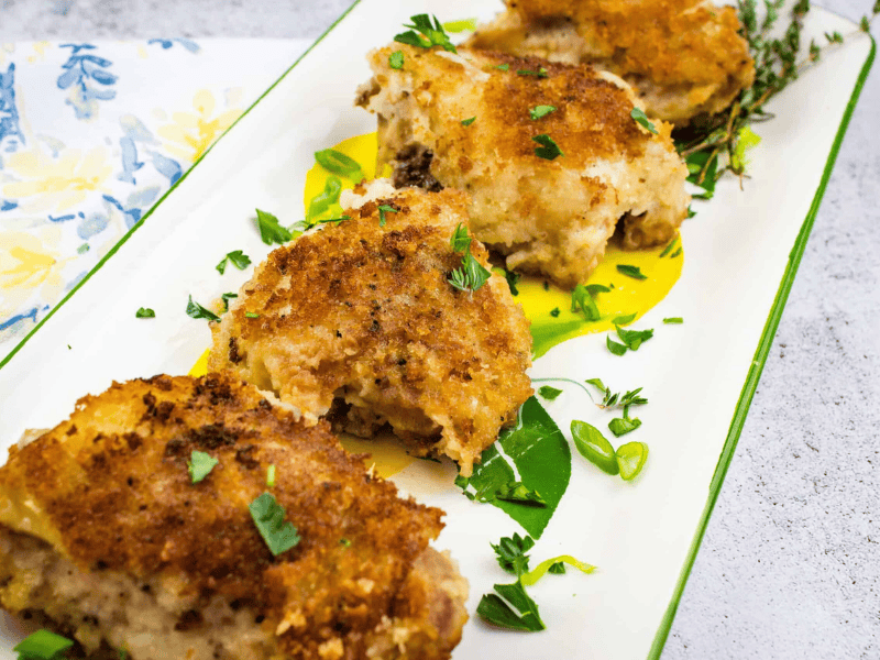 Oven Baked Chicken Thighs on a platter.