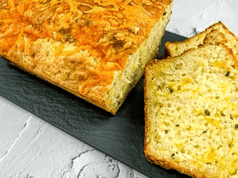 Potato Cheese Bread on a black board.