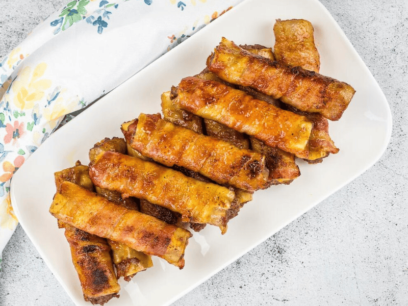 Smoked shotgun shells on a white plate.