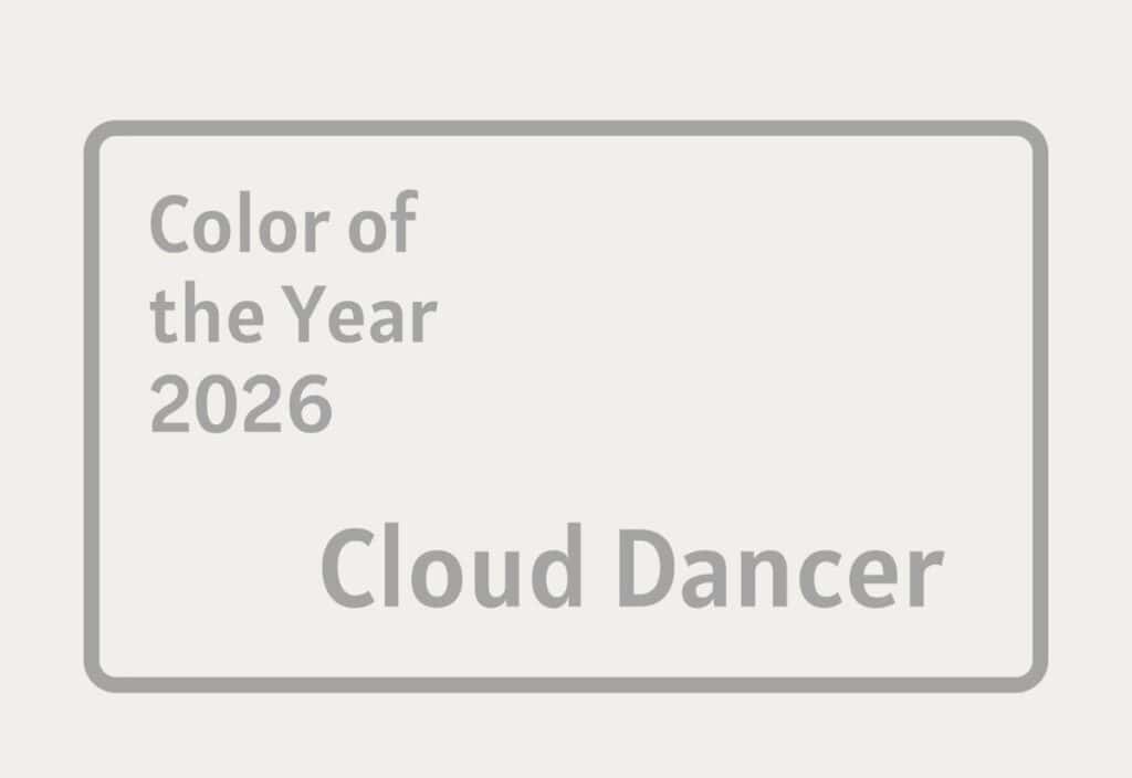 A white background displays a gray-bordered box with the text "Color of the Year 2026: Cloud Dancer" in light gray font.