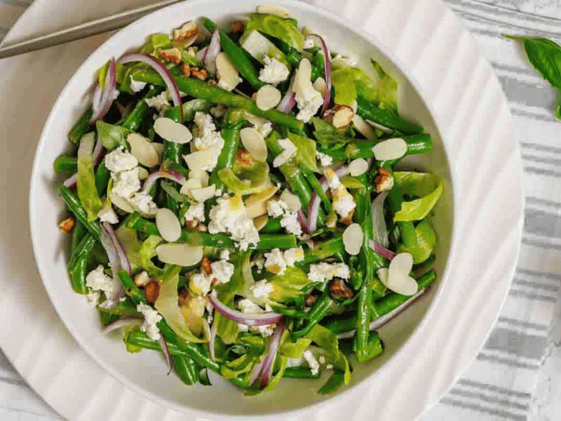 Overhead view of green bean salad served.