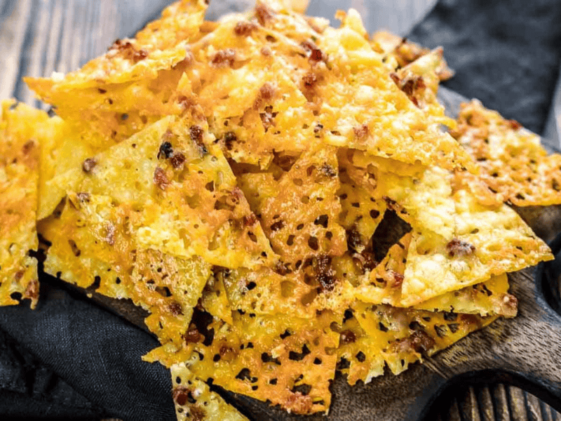 Keto Cheese Bacon Nachos Chips on a board.