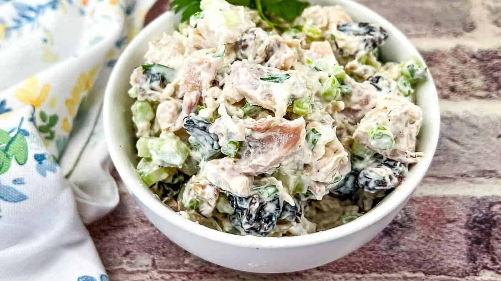 Chicken Salad with Walnuts and Cranberries in a bowl.