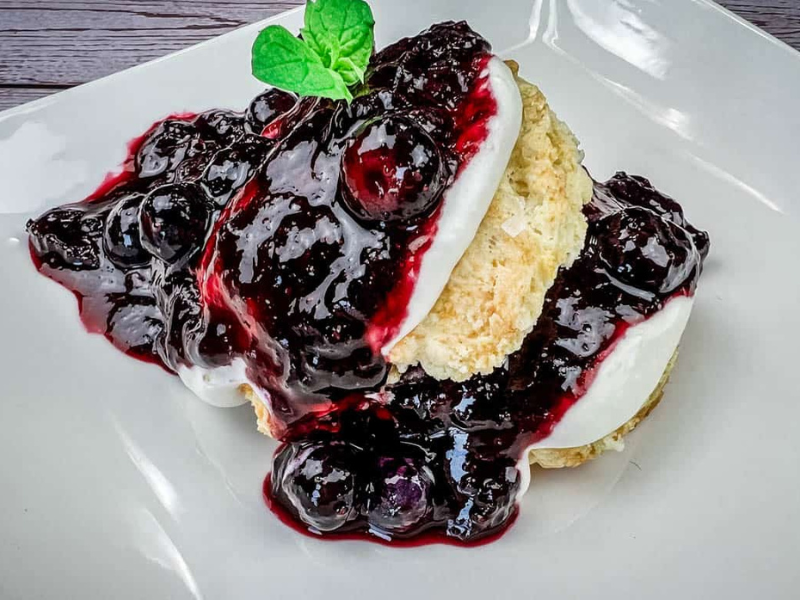 Close-up shot of Blueberry Shortcakes served on a white plate.
