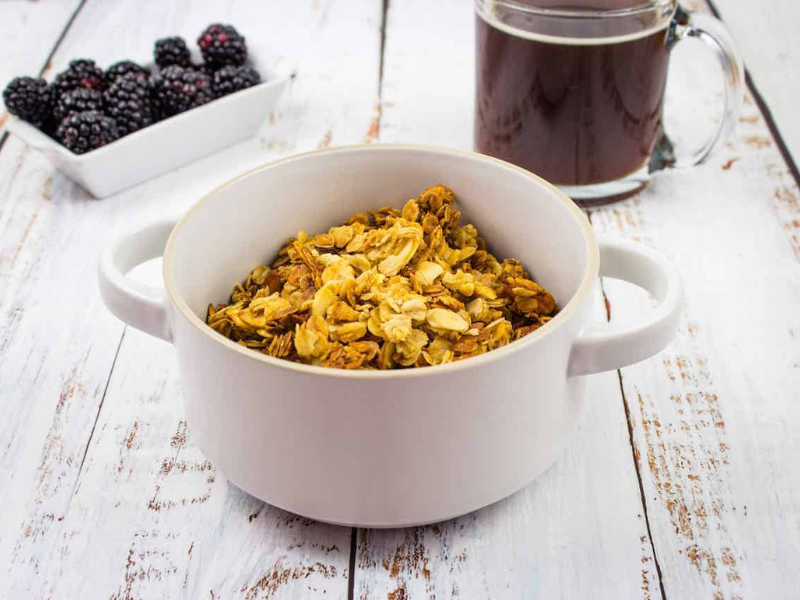Honey Almond Granola in a white bowl.