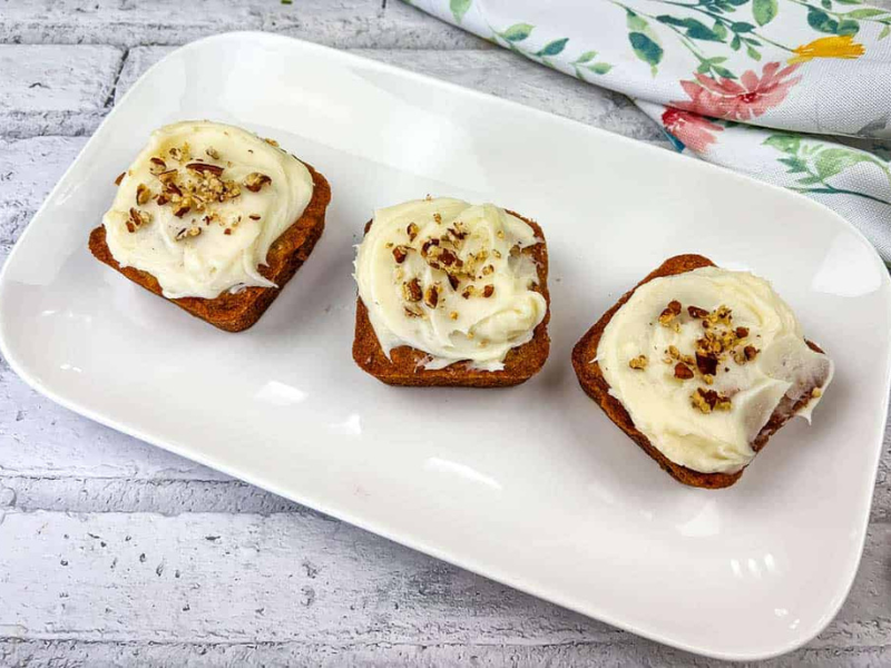 Three mini hummingbird cake on a white plate.