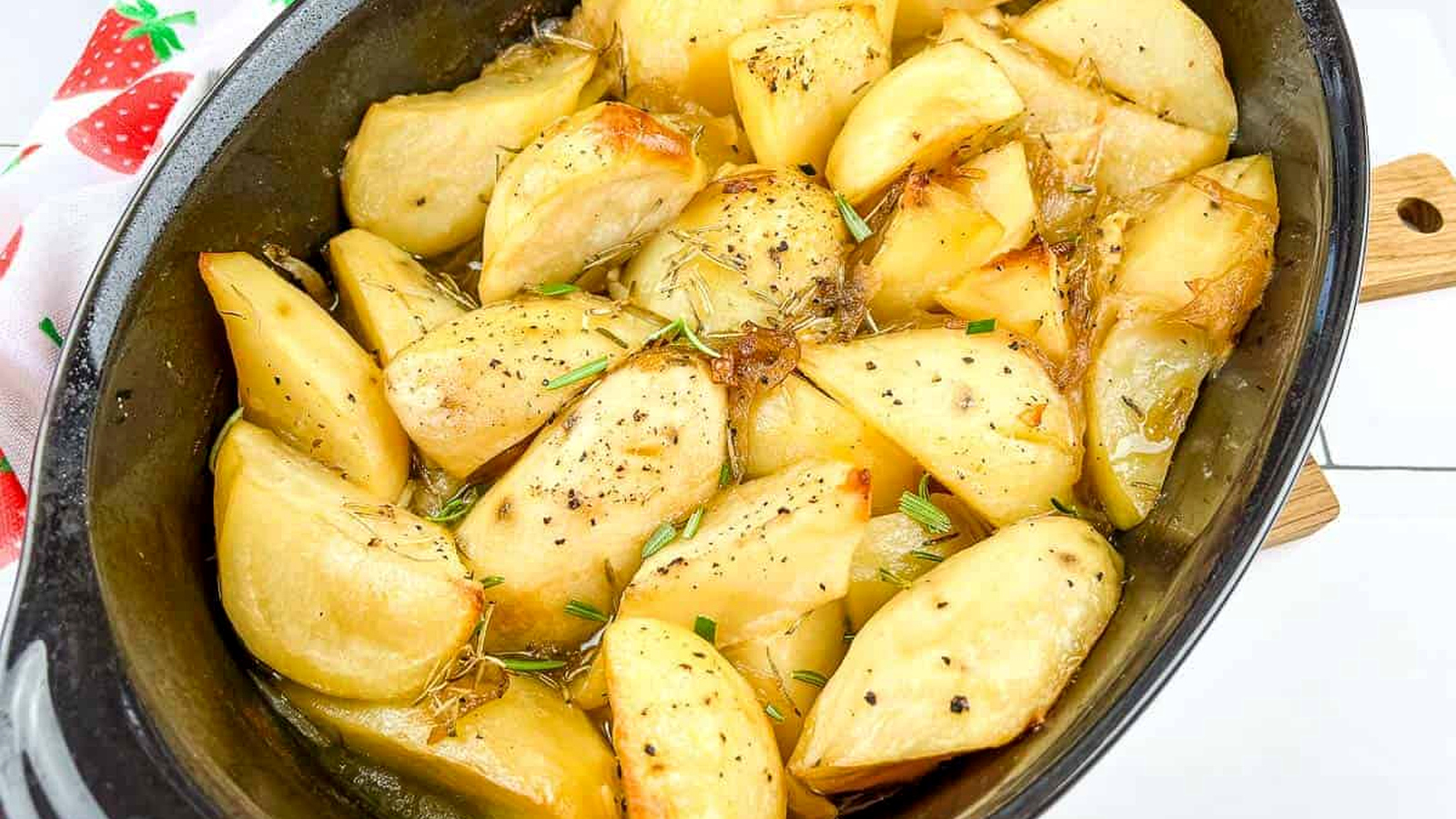Braised potatoes in a pan after cooking.